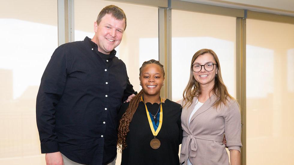 Naya Russell-Coprich with Victoria Terranova and Kyle Ward, associate professors in the Department of Criminology and Criminal Justice.